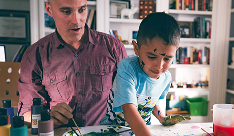 Father and son painting